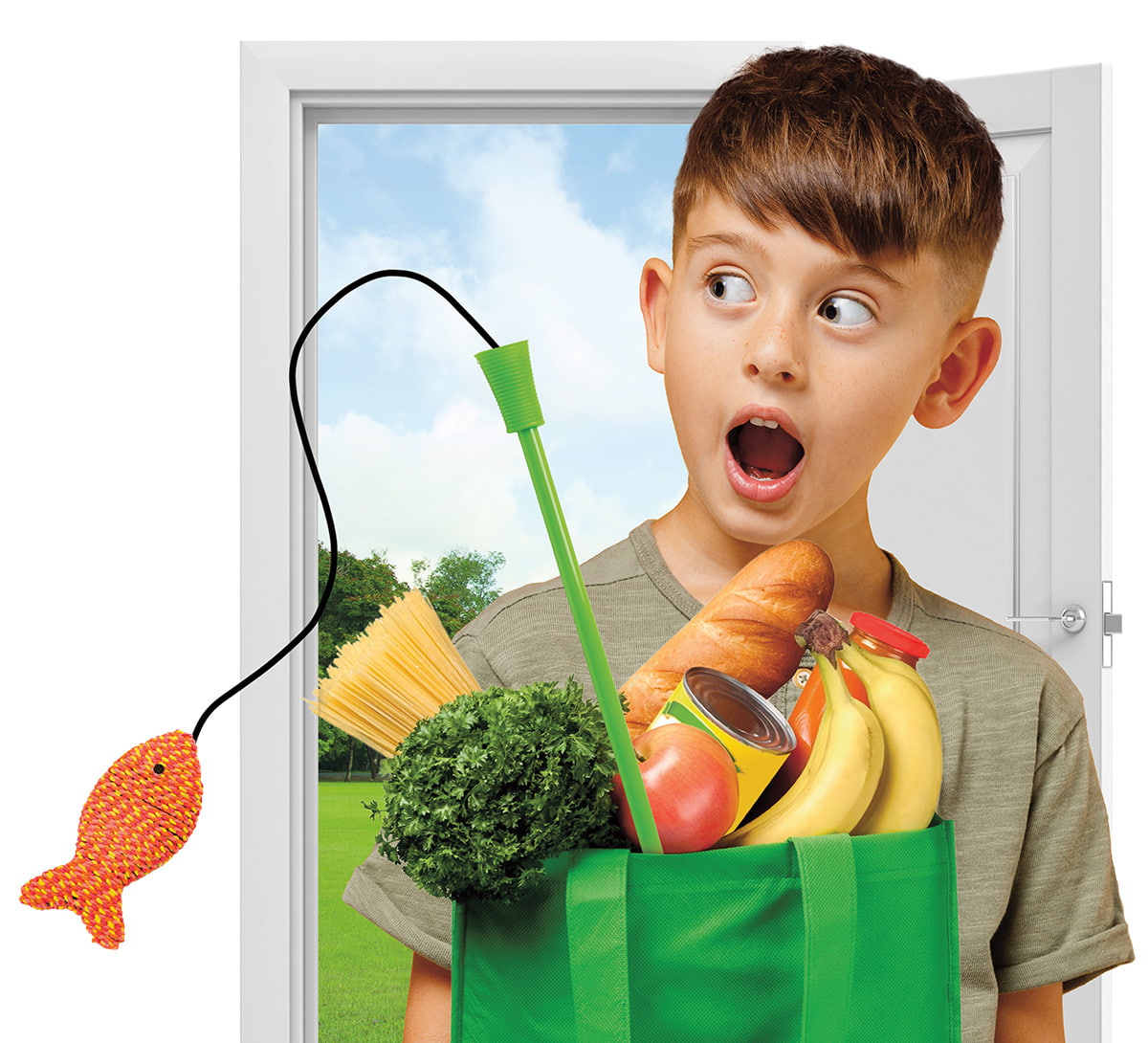 Image of a boy holding a bag of groceries