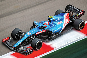 Photo of a sport car driver racing fast